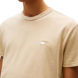 T-shirt maniche corte con badge frontale beige