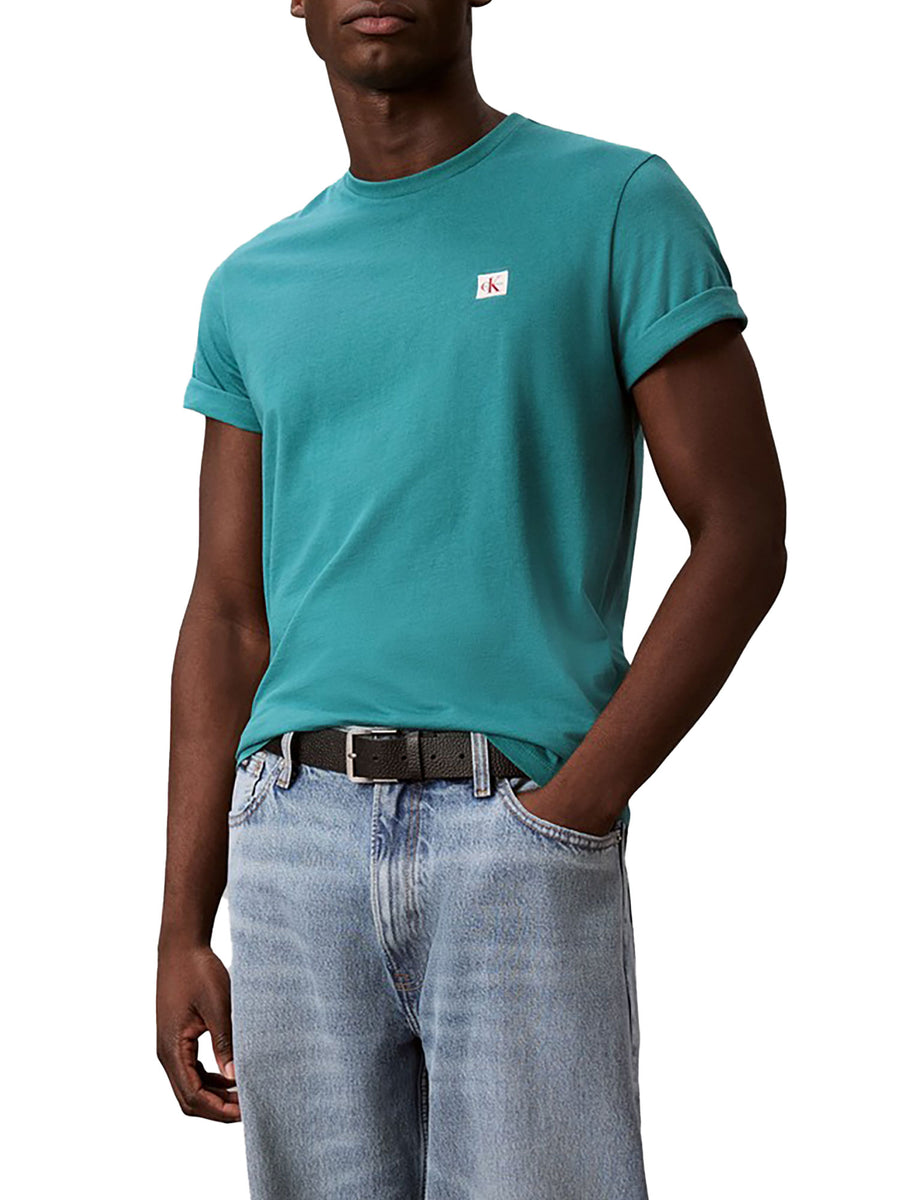 T-shirt Calvin Klein Jeans uomo con badge sul petto verde scuro