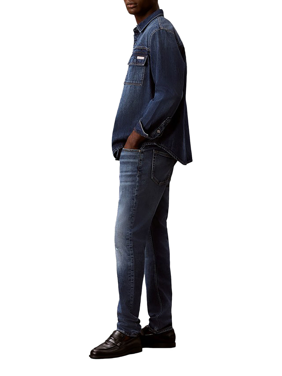 Jeans Calvin Klein Jeans uomo slim taper cinque tasche denim medio