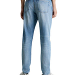 Jeans slim taper 
 denim medio - CityModa